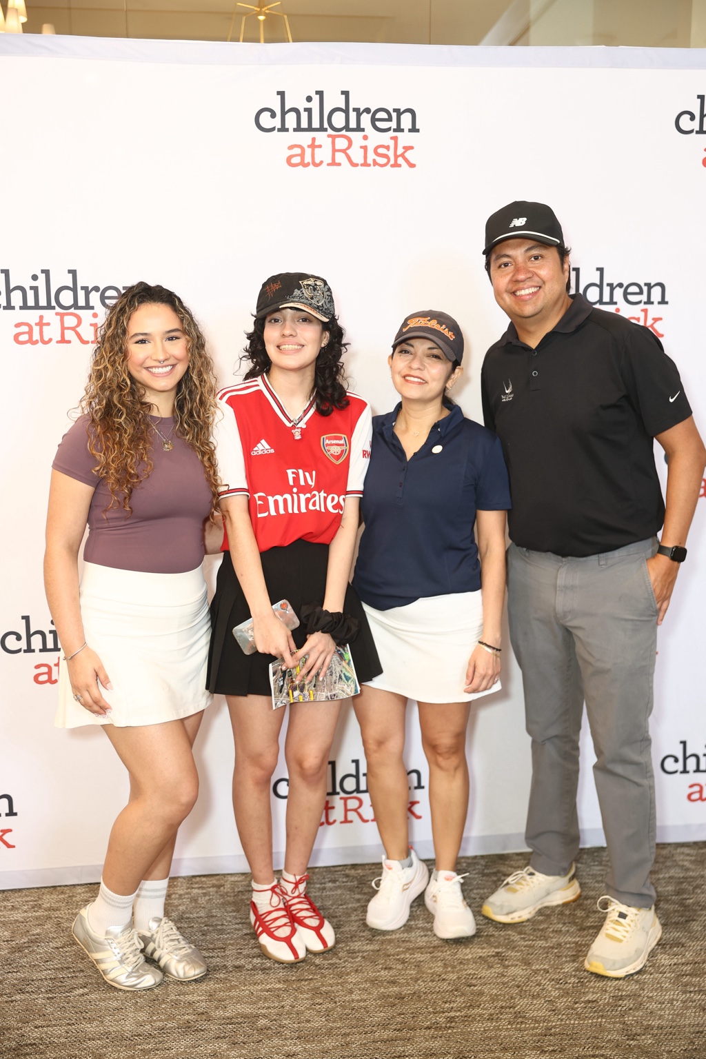 abby antoun with the CHILDREN AT RISK team at the Golf Classic